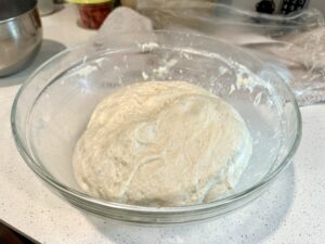 focaccia dough after folding and slapping four times